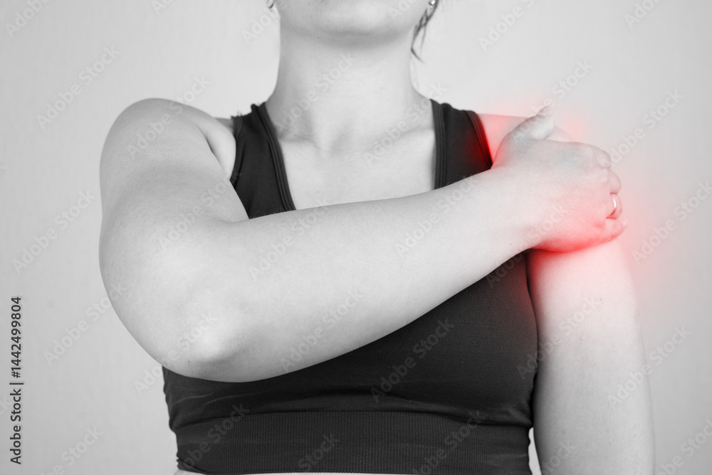 Pain in a woman's shoulder