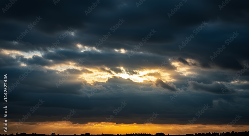 Dramatic cloudscape at sunrise or sunset Dramatic cloudscape at sunrise or sunset