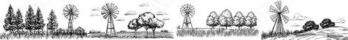 A rural landscape features the dark silhouettes of windmills and trees