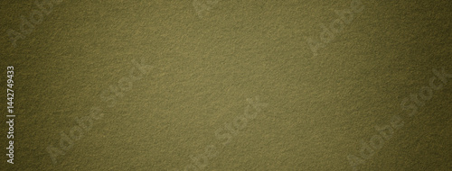 Texture dark green background from felt textile material with vignette, macro. Structure vintage olive fabric cloth