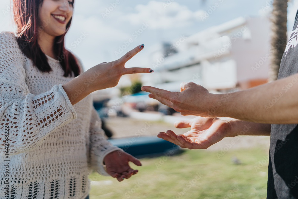 Two people interacting in a lighthearted outdoor activity, enjoying their time together during a sunny day. The scene captures joy, connection, and a sense of leisure. Two people interacting in a lighthearted outdoor activity, enjoying their time together during a sunny day. The scene captures joy, connection, and a sense of leisure.