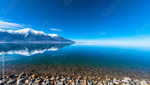 Obraz na płótnie Snow-Capped Mountains Reflecting in a Lake w salonie