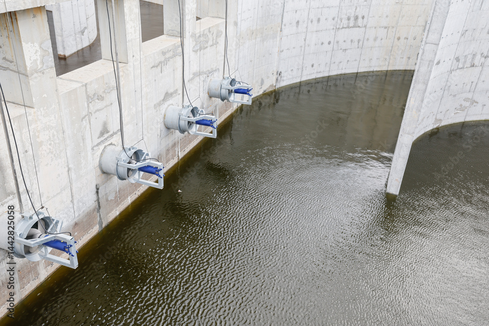 Biological treatment process in aeration basin closeup. Specialized equipment serves for breakdown of organic pollutants by infusion of oxygen
