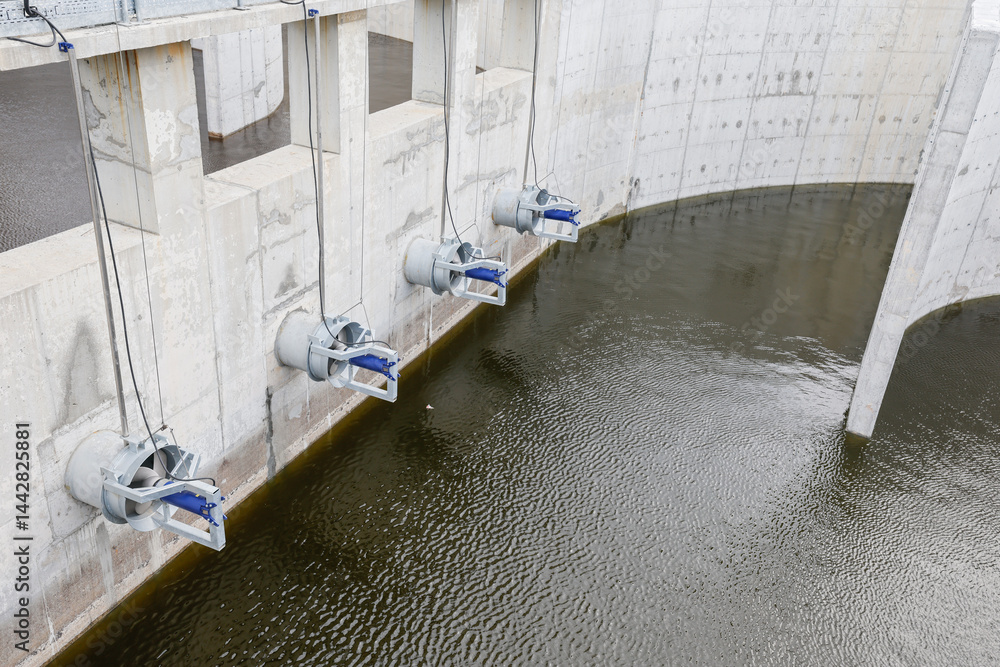 Biological treatment process in aeration basin closeup. Specialized equipment serves for breakdown of organic pollutants by infusion of oxygen