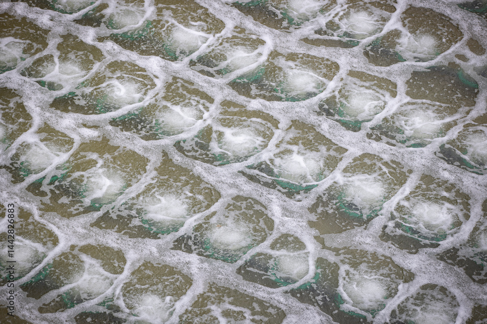 Biological treatment process in aeration basin closeup. Specialized equipment serves for breakdown of organic pollutants by infusion of oxygen
