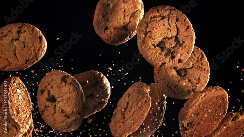 Oatmeal cookies fly up and fall down. Filmed on a high-speed camera at 1000 fps. High quality FullHD footage