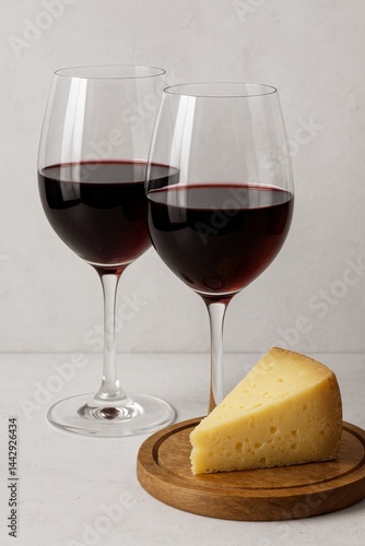 Pairing Wine and Cheese With a Selection of Gourmet Cheeses and Red Wine in a...