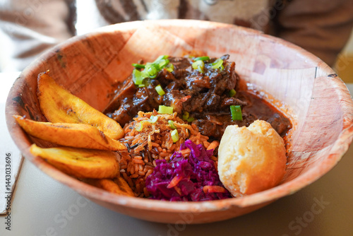 Caribbean oxtail, Jamaican fried dumpling and fried sweet plantain