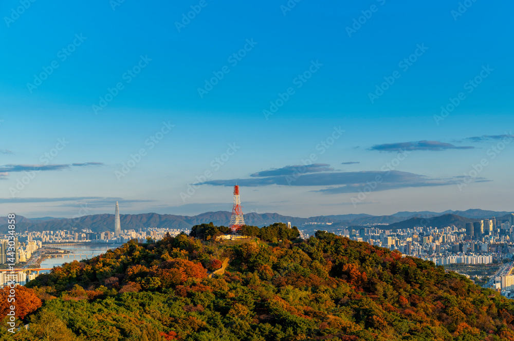 Seoul cityscapes with high rise office buildings and skyscrapers in Seoul city, Republic of Korea in winter blue sky