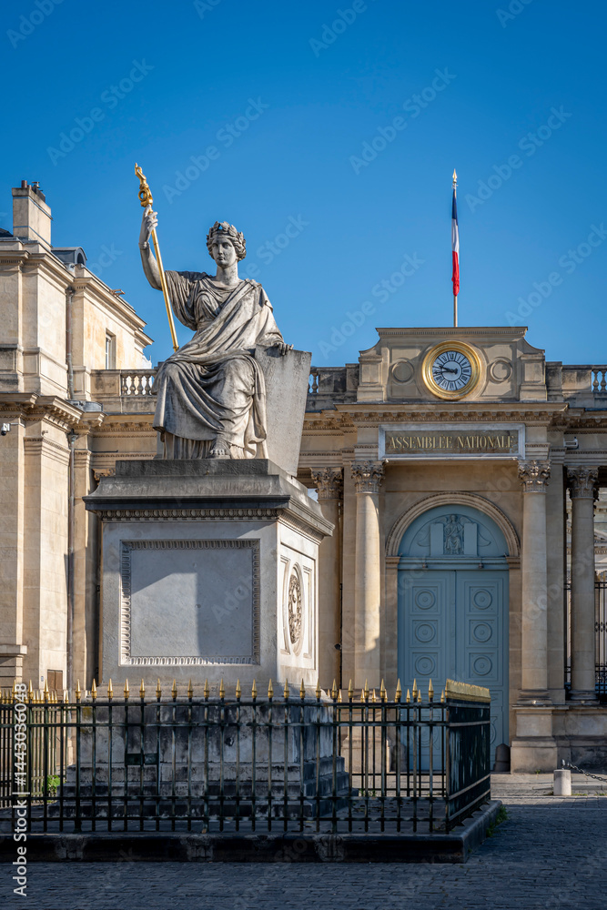 Obraz premium Paris, France - 04 18 2025: View of the National Assembly from Place du Palais Bourbon with its statue of Law.