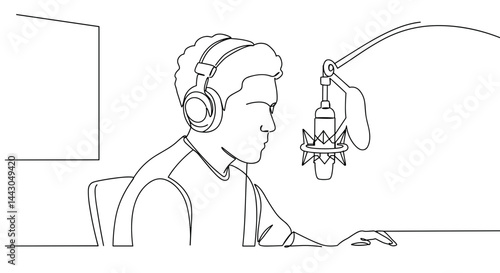 Young man recording audio at microphone in studio setting  