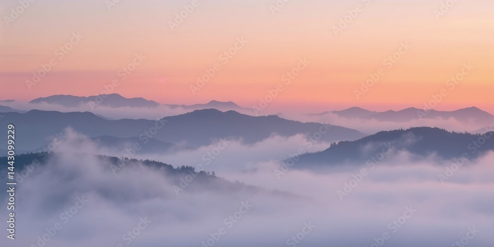 Soft pastel misty mountains at dawn with fog and sunrise, copy space Soft pastel misty mountains at dawn with fog and sunrise, copy space