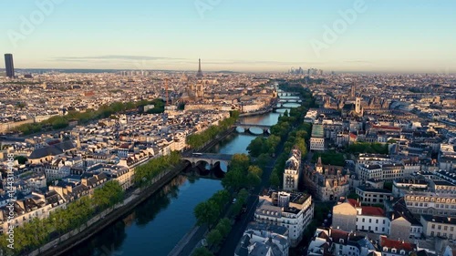 Wallpaper Mural Stunning aerial view showcases Parisian landmarks, including the iconic Eiffel Tower, elegantly framed at sunrise. France Torontodigital.ca