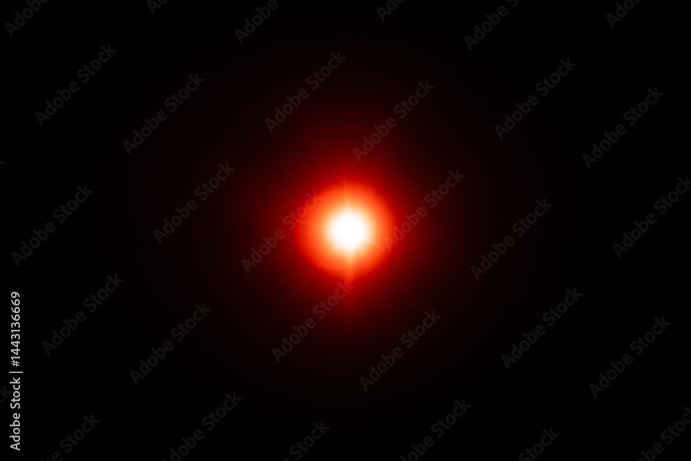 Bright Red Light Glow Against Dark Background Bright Red Light Glow Against Dark Background