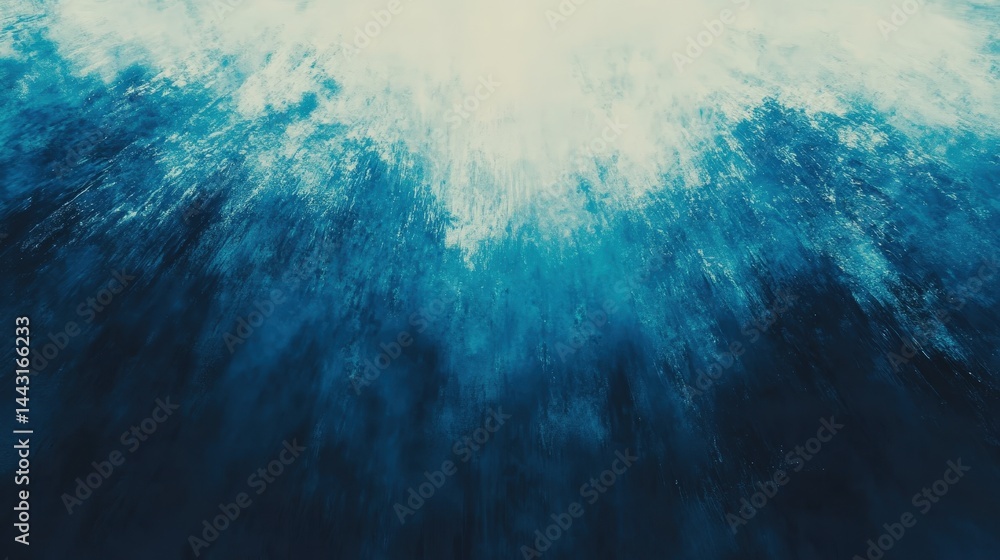 Obraz premium Abstract blue and white splash resembling ocean waves, creating a dynamic underwater effect