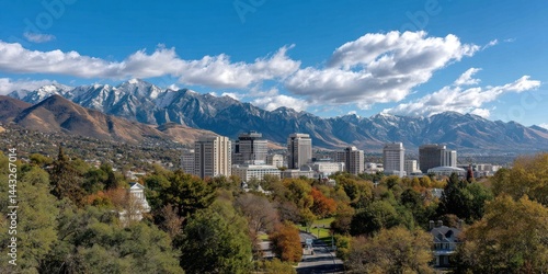 City nestled in a mountain valley, autumn colors