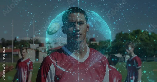 Team wearing red jerseys on soccer field, showcasing technology holographic globe overlay