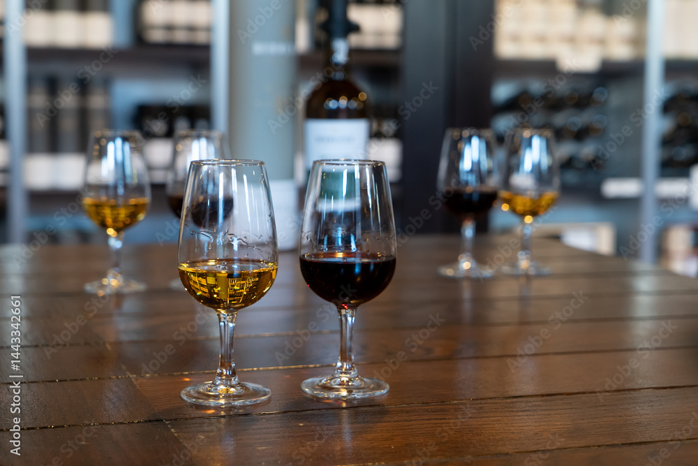 port wine testing, glasses with drink samples in bar