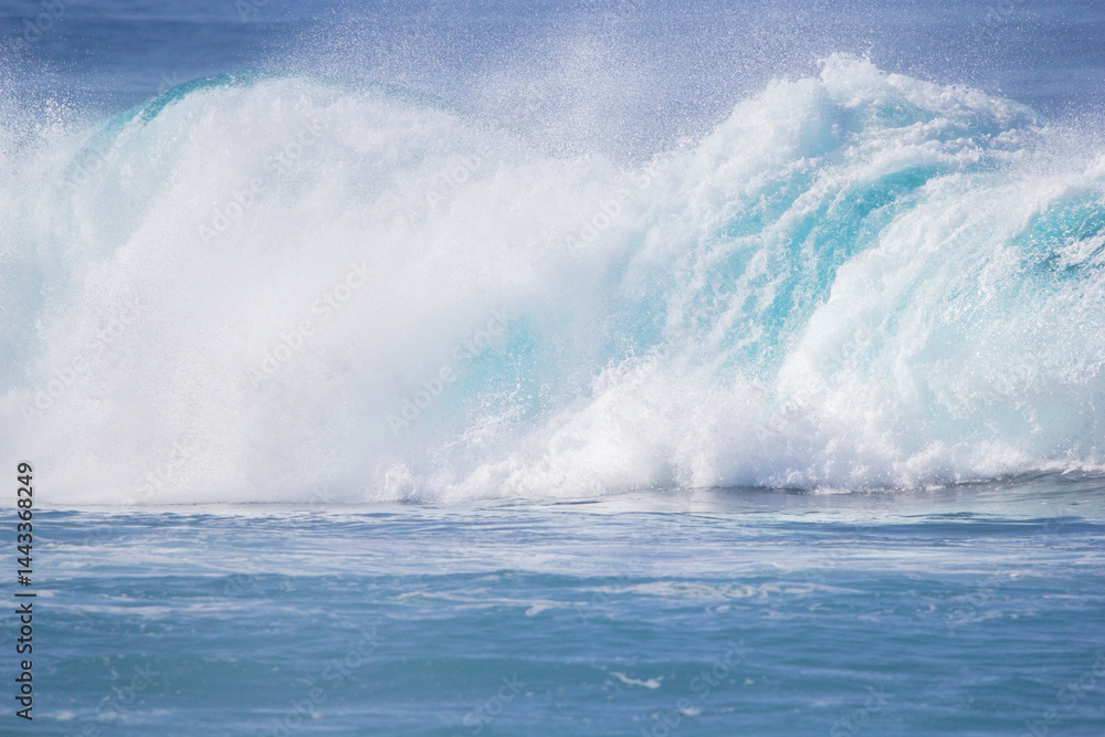 Crushing surf waves in crystal clear turquoise blue colour water close up Crushing surf waves in crystal clear turquoise blue colour water close up