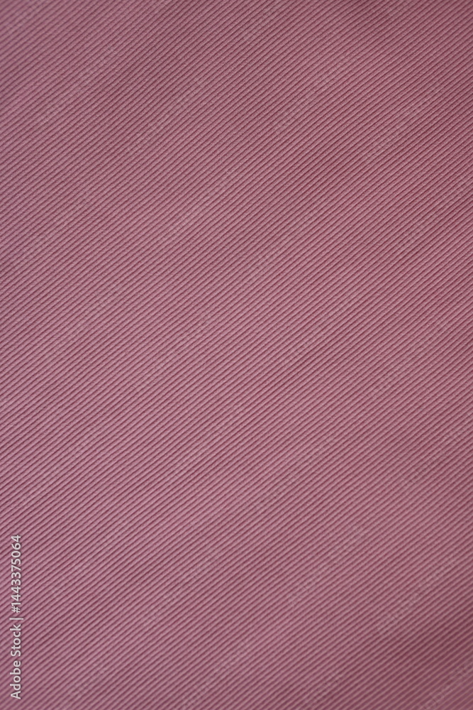 Fototapeta premium pink texture of knitted synthetic fabric as a background, pink smooth symmetrical lines of synthetic fabric 