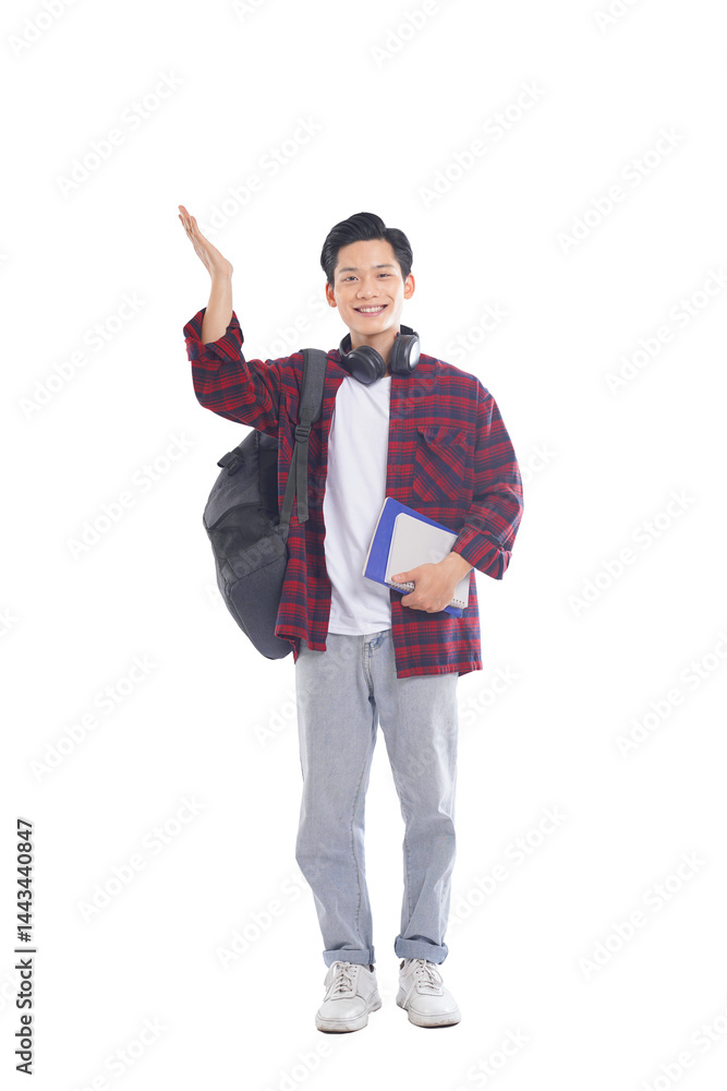 portrait of asian male student with backpack, holding books posing on white background, education concept portrait of asian male student with backpack, holding books posing on white background, education concept