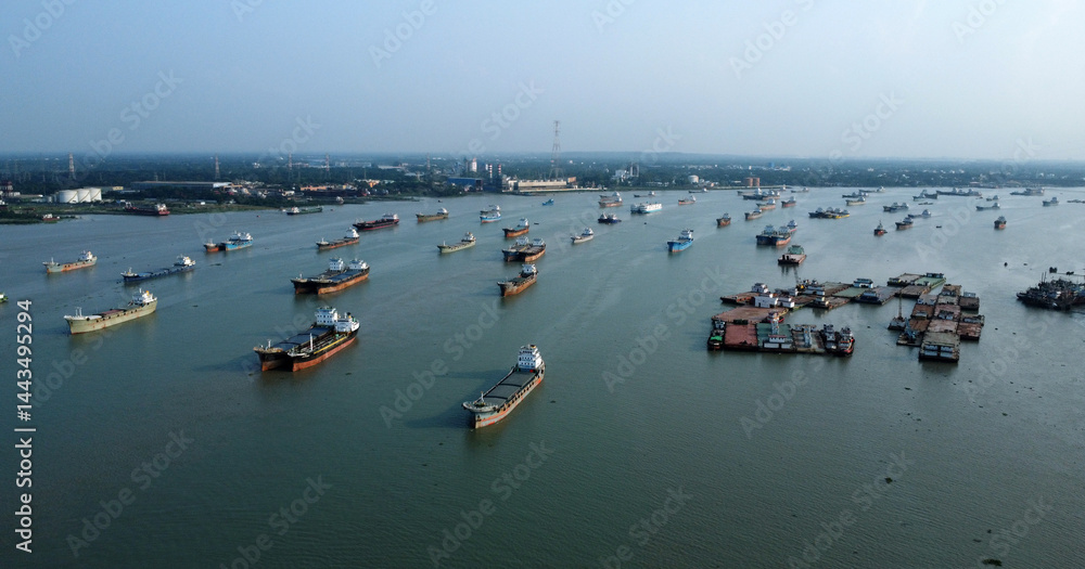 Aerial view of the lighter ship carrying goods,oil tanker anchor in the sea port chittagong,Bangladesh. For energy export and import business for transportation Aerial view of the lighter ship carrying goods,oil tanker anchor in the sea port chittagong,Bangladesh. For energy export and import business for transportation