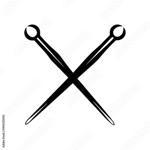 Two black knitting needles crossed on a white background creating an X shape