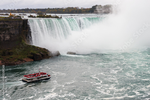 Fototapeta Naklejka Na Ścianę i Meble -  Niagara falls boat tour in Ontario, Canada.