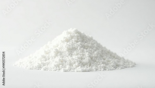 Pile of white granulated sugar on white background, beet sugar, background