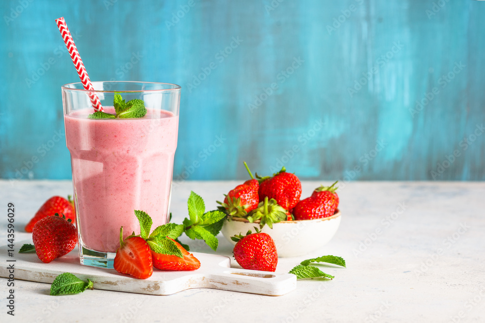 Strawberry smoothie or milkshake on white.
