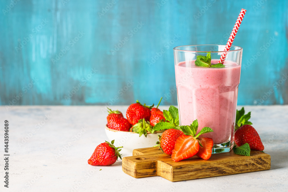Strawberry smoothie or milkshake on white.
