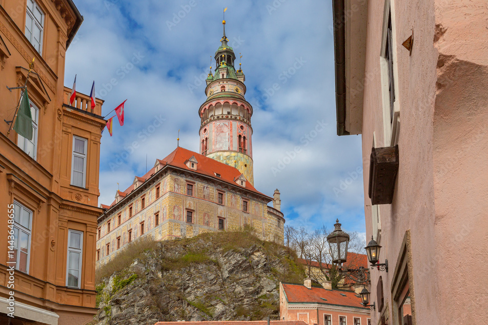 Street view of historic tower and buildings in Cesky Krumlov, Czech Republic