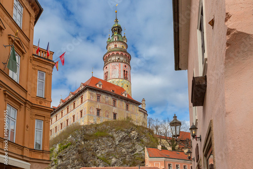 Street view of historic tower and buildings in Cesky Krumlov, Czech Republic