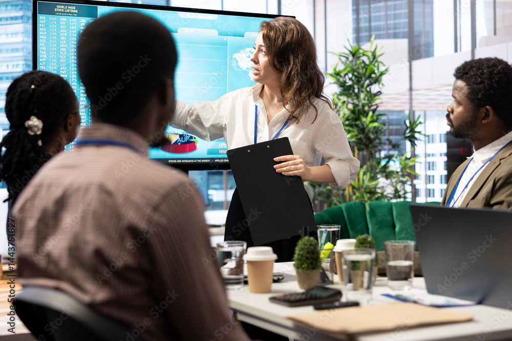 Business associates reviewing key performance indicators within the enterprise activity. Conducting evaluations and discuss training to foster professional development, enhance team efficiency.