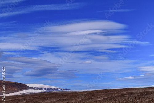 Icelandic rural mountain landscape with melting snow near Langjokull glacier, West Highlands,  Iceland