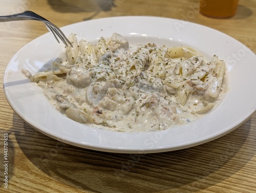 oatmeal with chopped nuts and honey, warm breakfast foods, creamy porridge, cozy meal