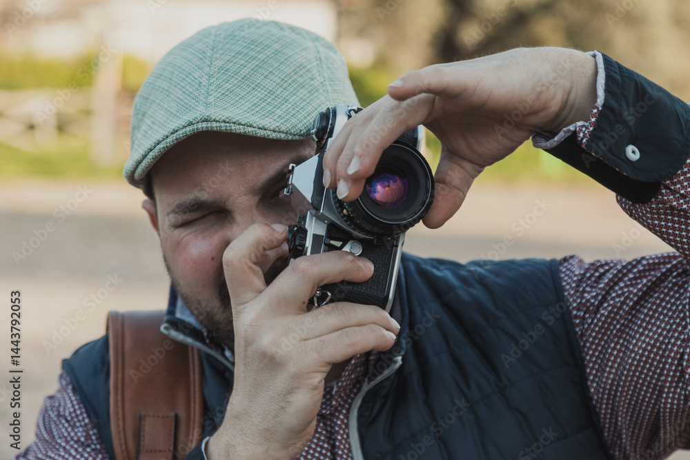 Photographer Taking Vertical Photos At The Park