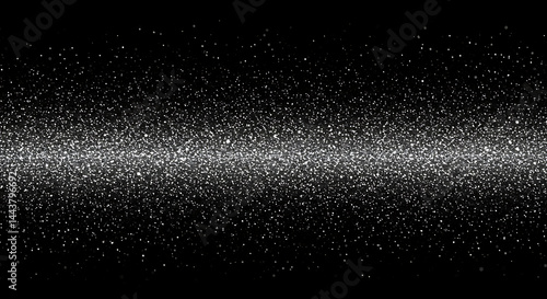 Glittering silver sparkles on black background create a festive and celebratory atmosphere ideal for holiday designs and elegant projects