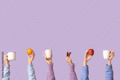 Multiple hands holding mugs...