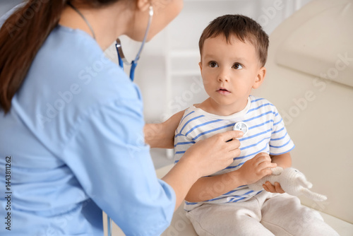 Female pediatrician with st...