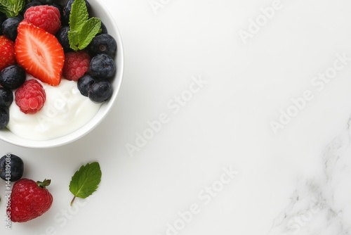 Obraz na płótnie Yogurt bowl with fresh berries and mint leaves healthy food concept w salonie