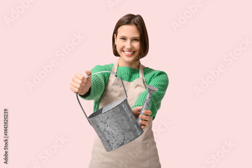 Smiling young woman in gree...