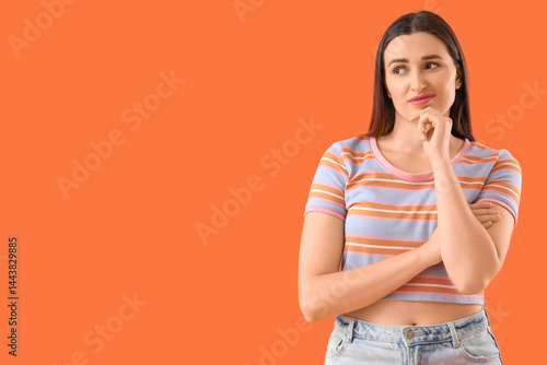 Wondering young woman on or...