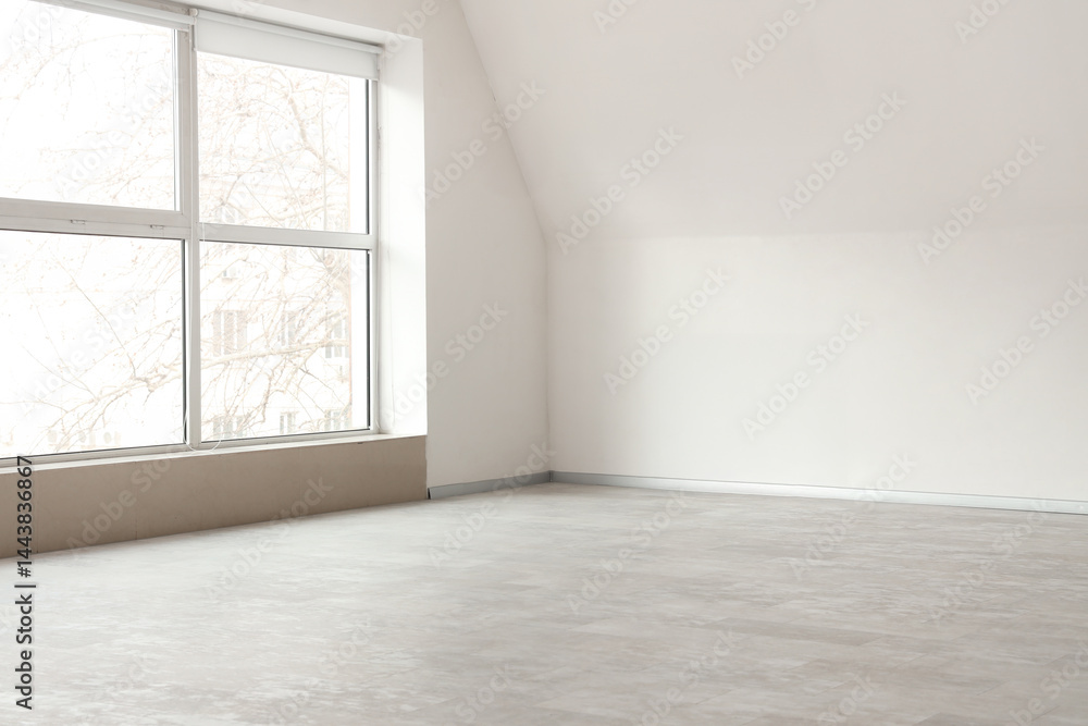 Fototapeta premium View of light wall with air conditioner in big empty room