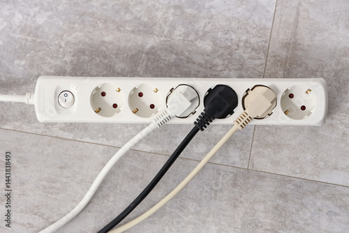 Extension cord with plugs o...