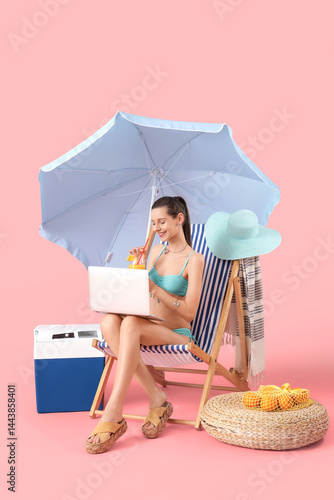 Young woman with cocktail a...