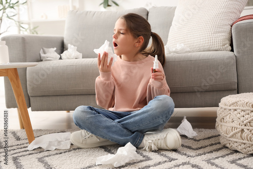 Allergic girl with tissue a...