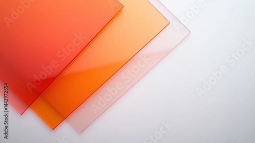 Three translucent orange acrylic sheets overlap on a white background, creating a modern, minimalistic composition.