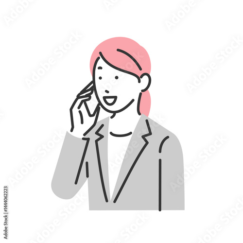 スマホで電話をしているビジネスウーマン