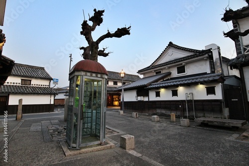 Vintage telephone booth at Kurashiki Bikan Historical Quarter (old town) in Japan (Japanese words mean 